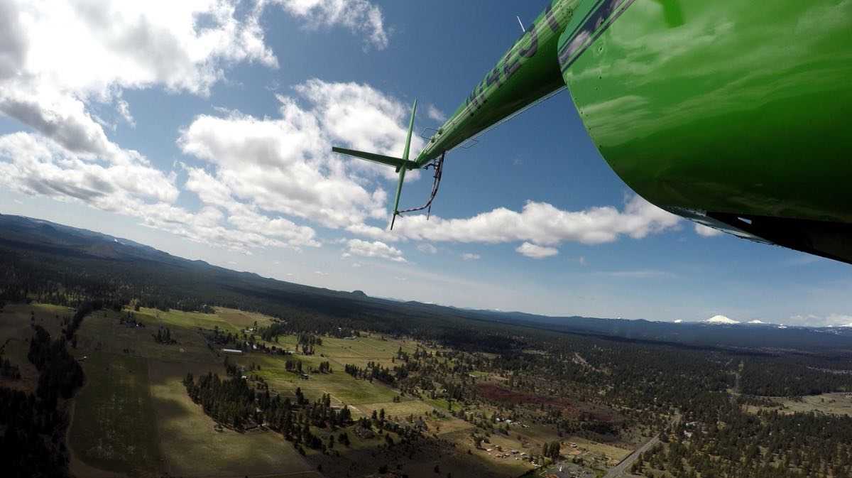 Helicopter in flight for a blog about emerging aviation technologies